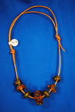 Necklace with Amber & Brown & Brass beads on leather - Joy Beadz Glass Jewelry